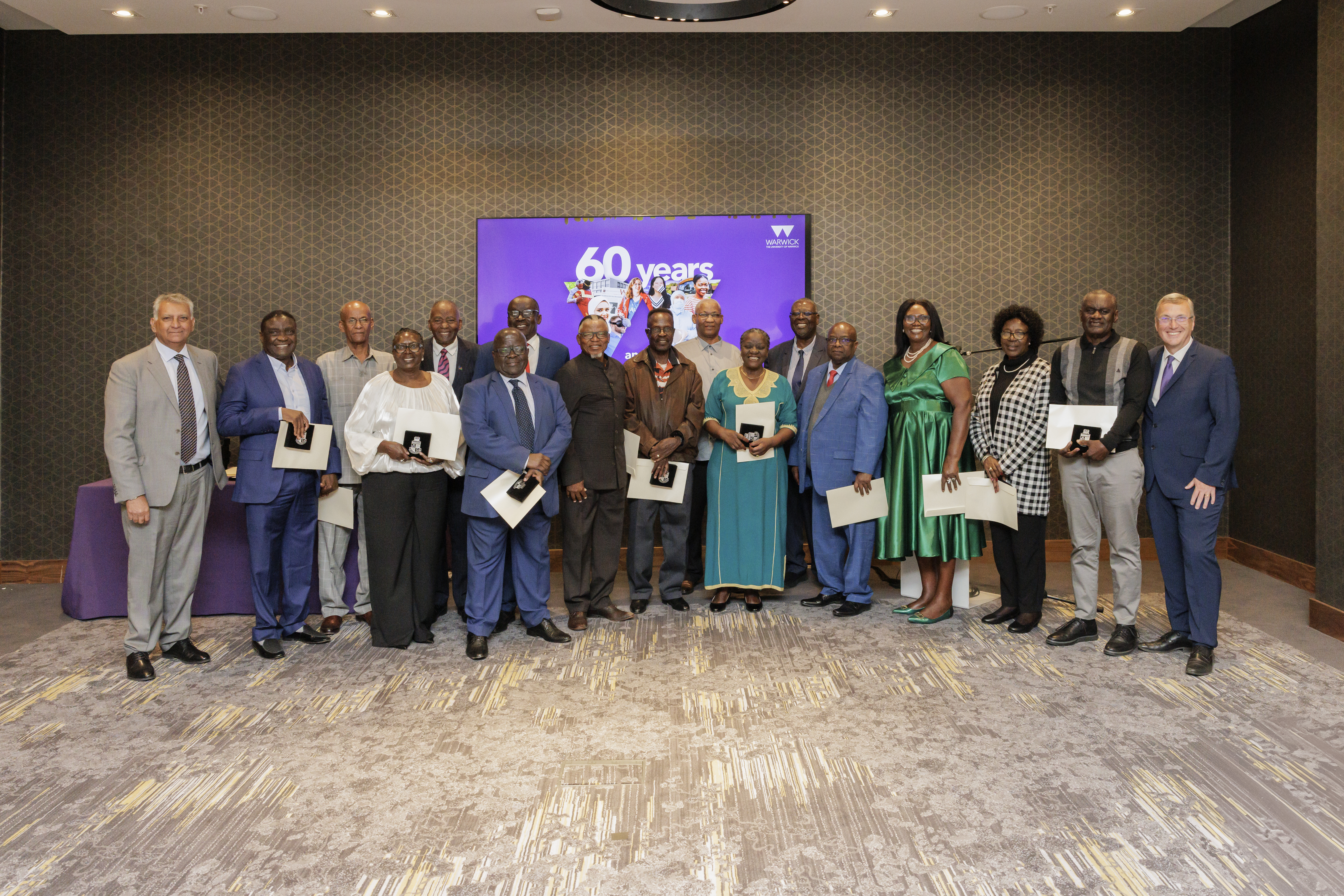 Group photo of 16 Ashton Award winners with the Vice Chancellor Professor Stuart Croft