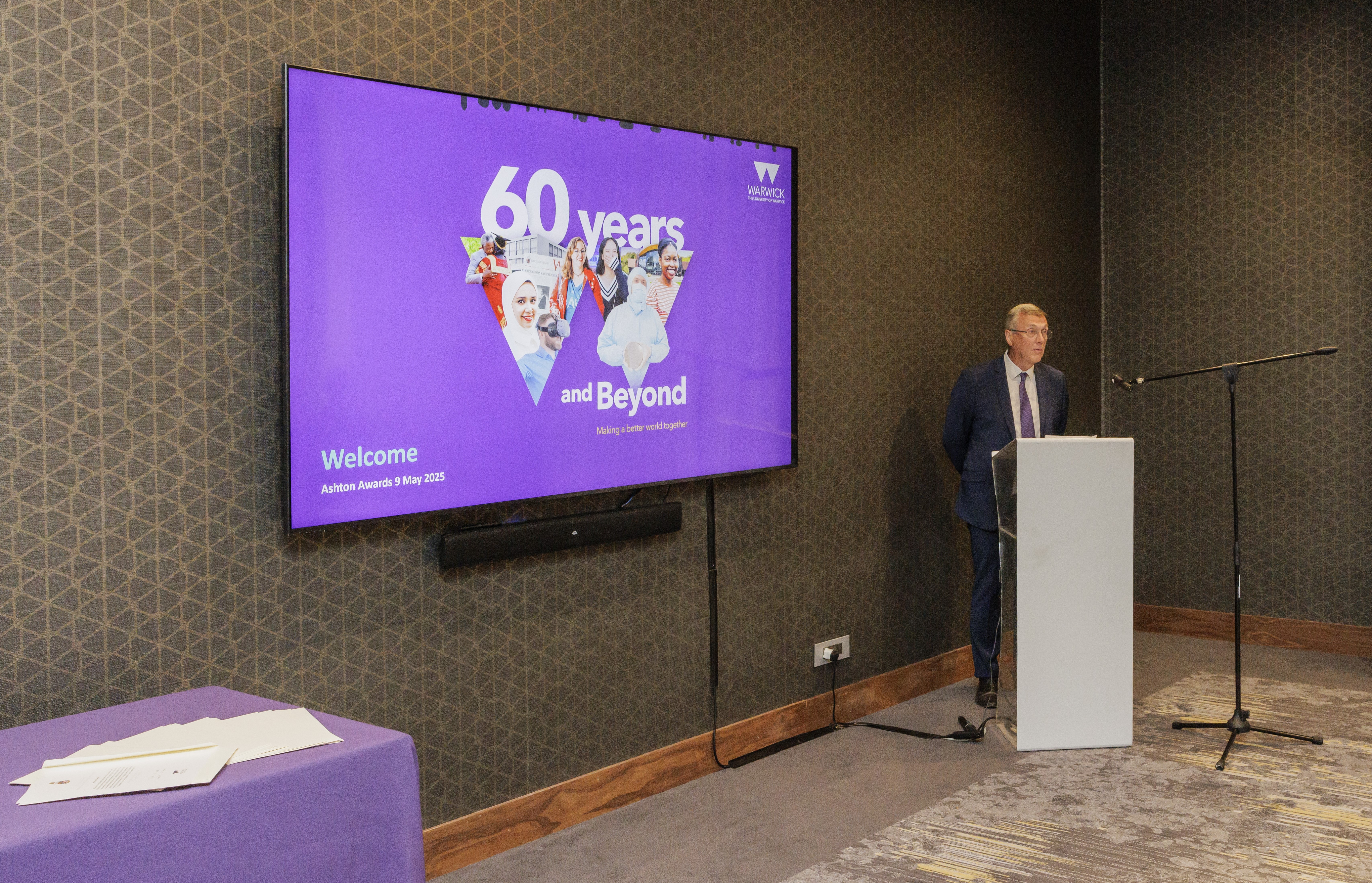 Vice Chancellor Stuart Croft standing behind a lectern