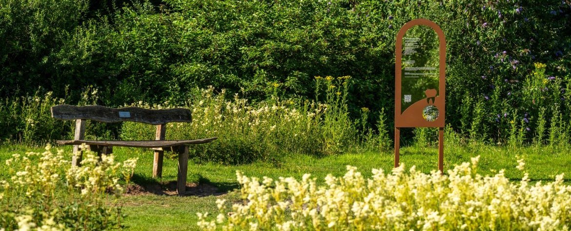 Poetry Trail post by a bench 