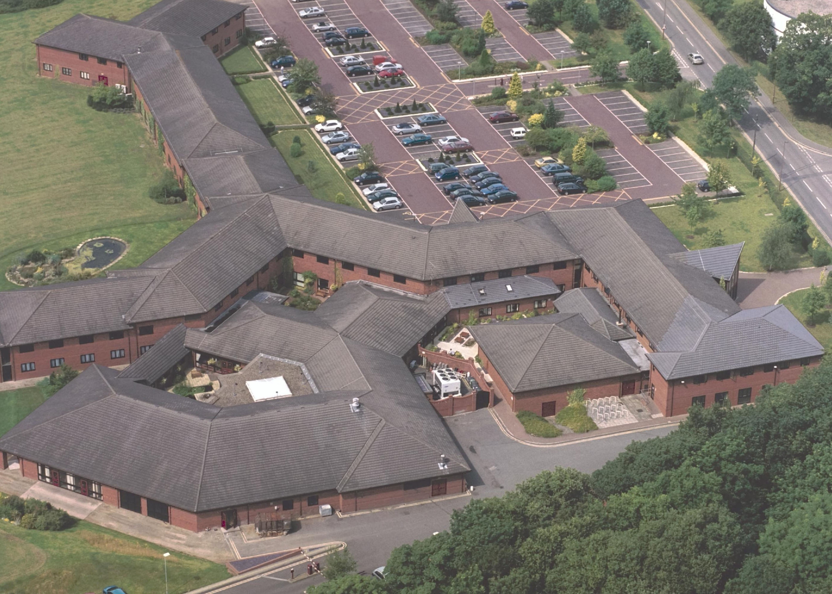 An aerial photograph of the Radcliffe conference building and WBS training centre at the University of Warwick