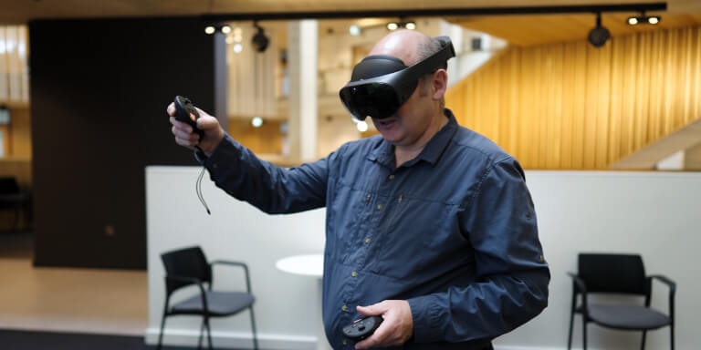 Doctor demonstrating VR headset