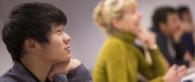 A student paying attention in a class