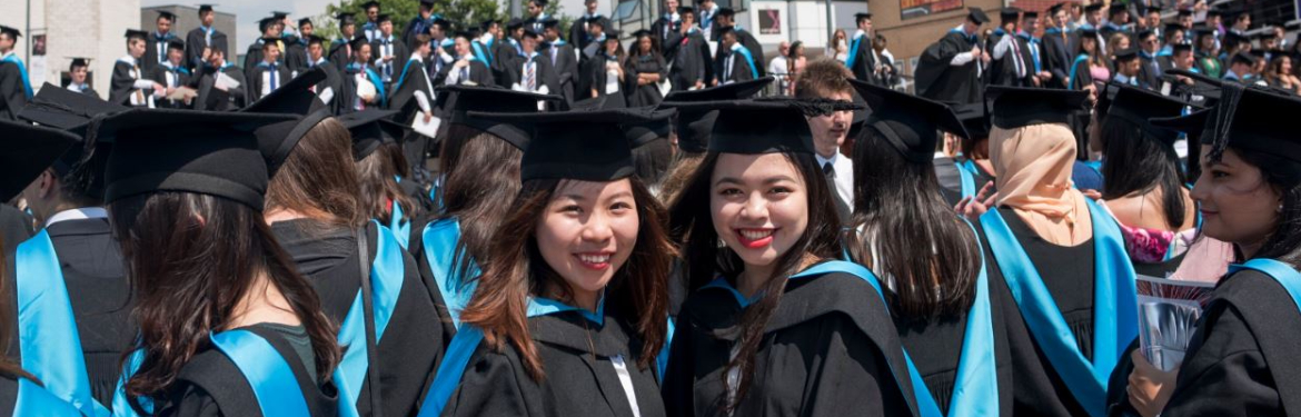 Two University of Warwick students on graduation day.