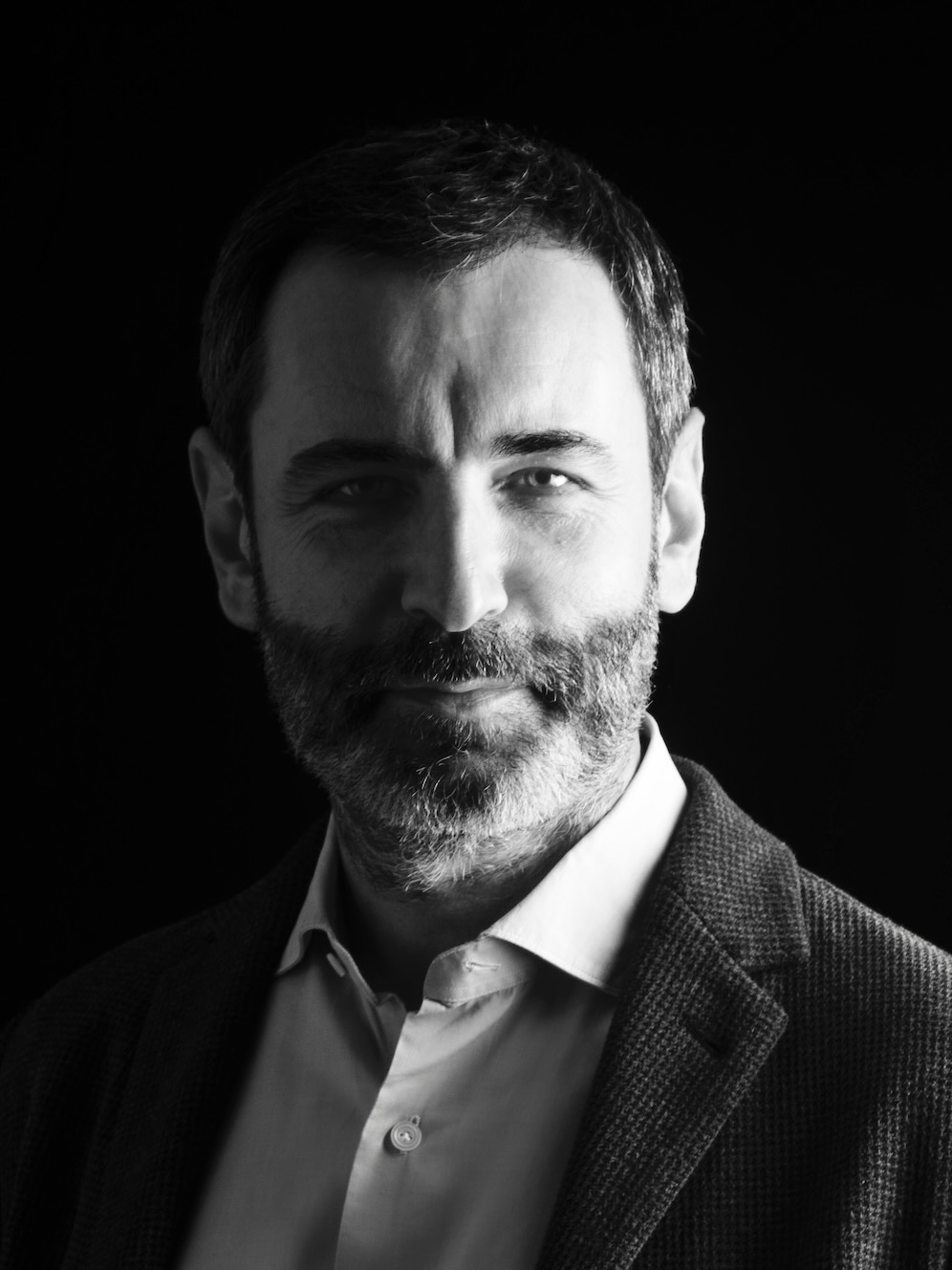 Black and white headshot of Giorgio