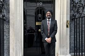 Jassa standing outside 10 Downing Street
