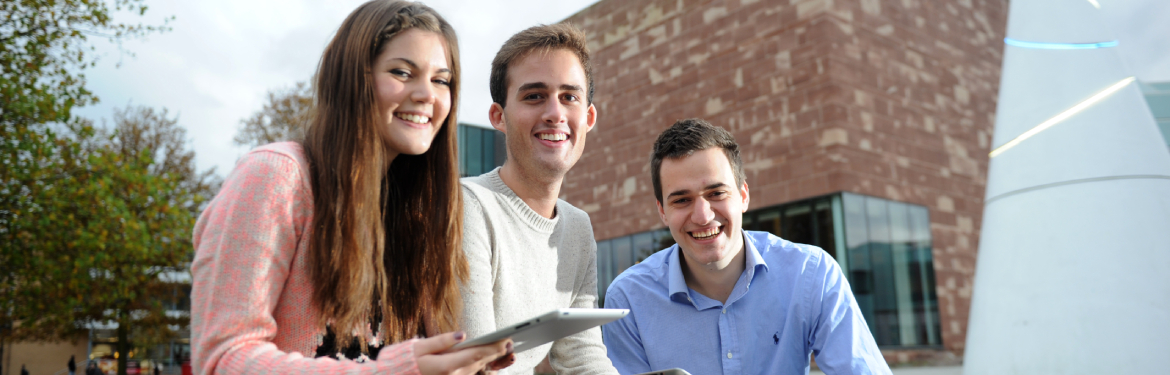 Students sat outside the Warwick Arts Centre.