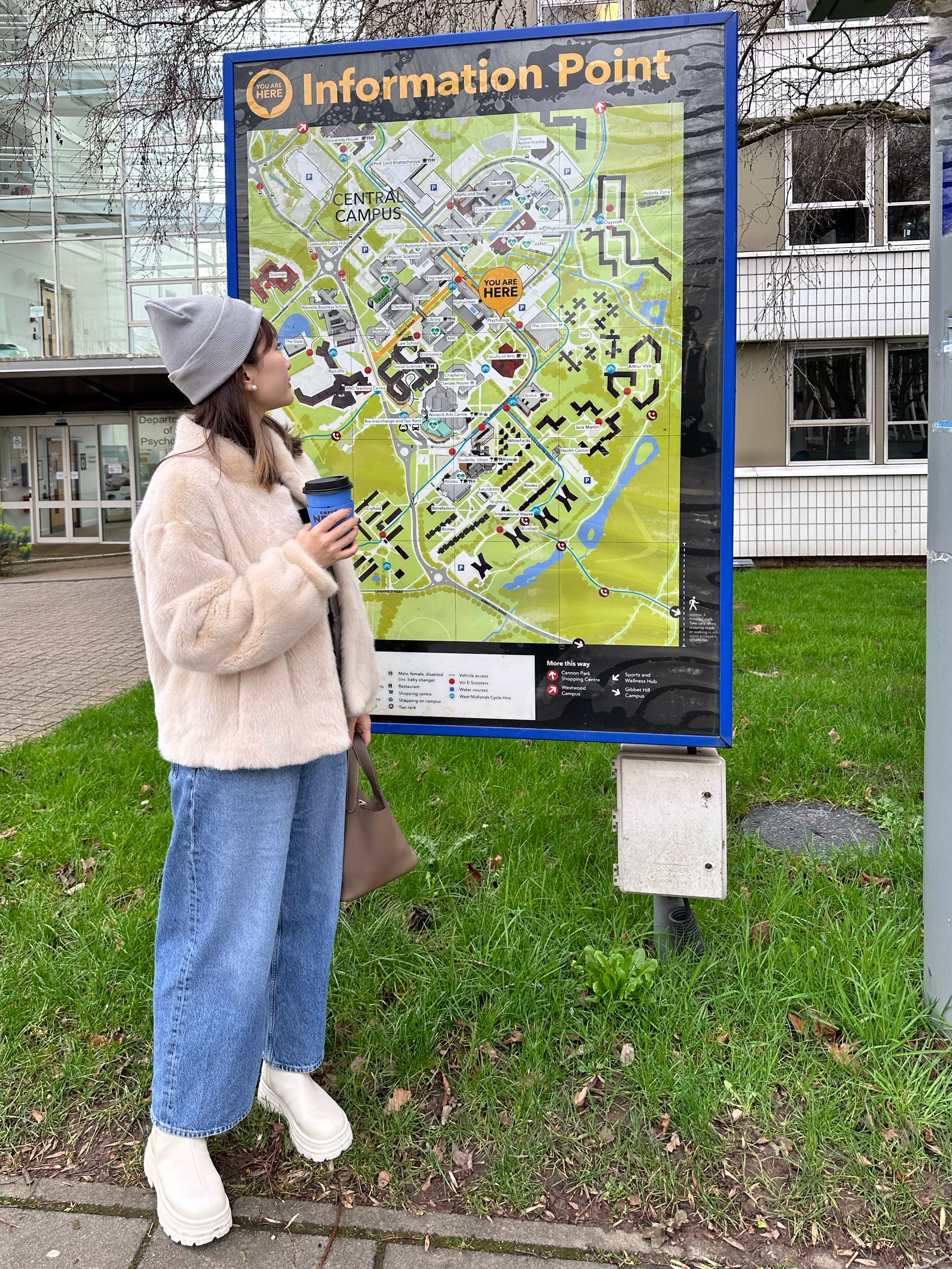 Ruoyu looking at a campus map