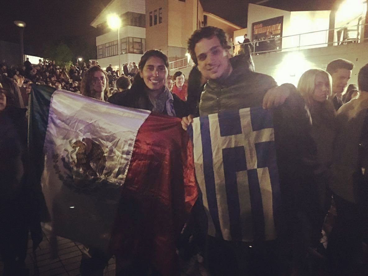 Vasileios holding a Greek flag