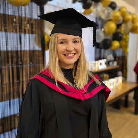 Faye in her graduation robes
