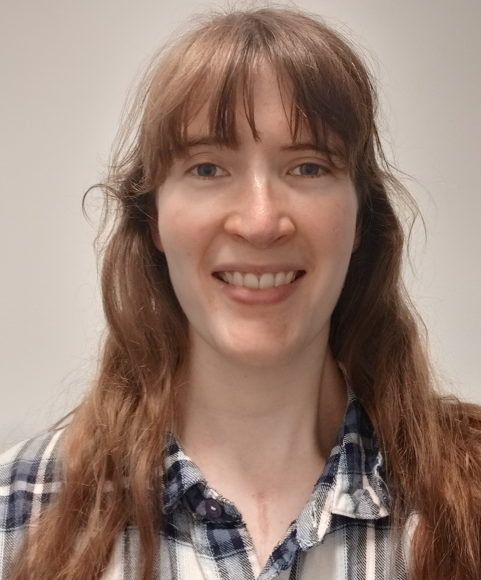 Beth smiling at the camera