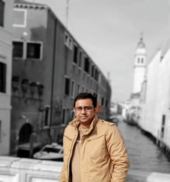 Biswajit looking at camera.