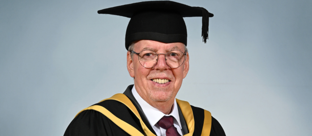 Jeffrey in his graduation robes