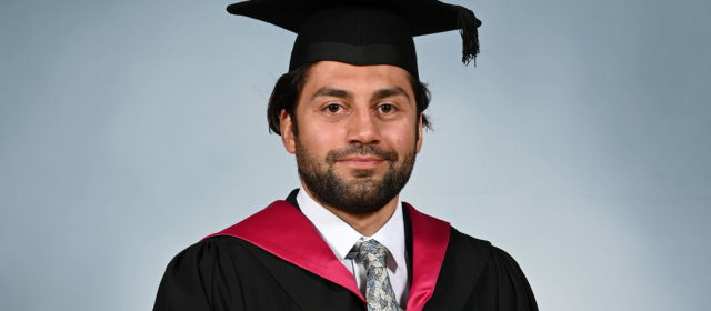 Tier in his graduation robes