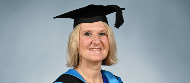 Claire in her graduation robes