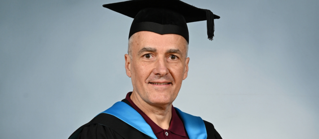 Jose in his graduation robes