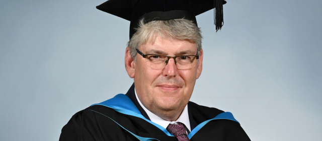 Paul in his graduation robes