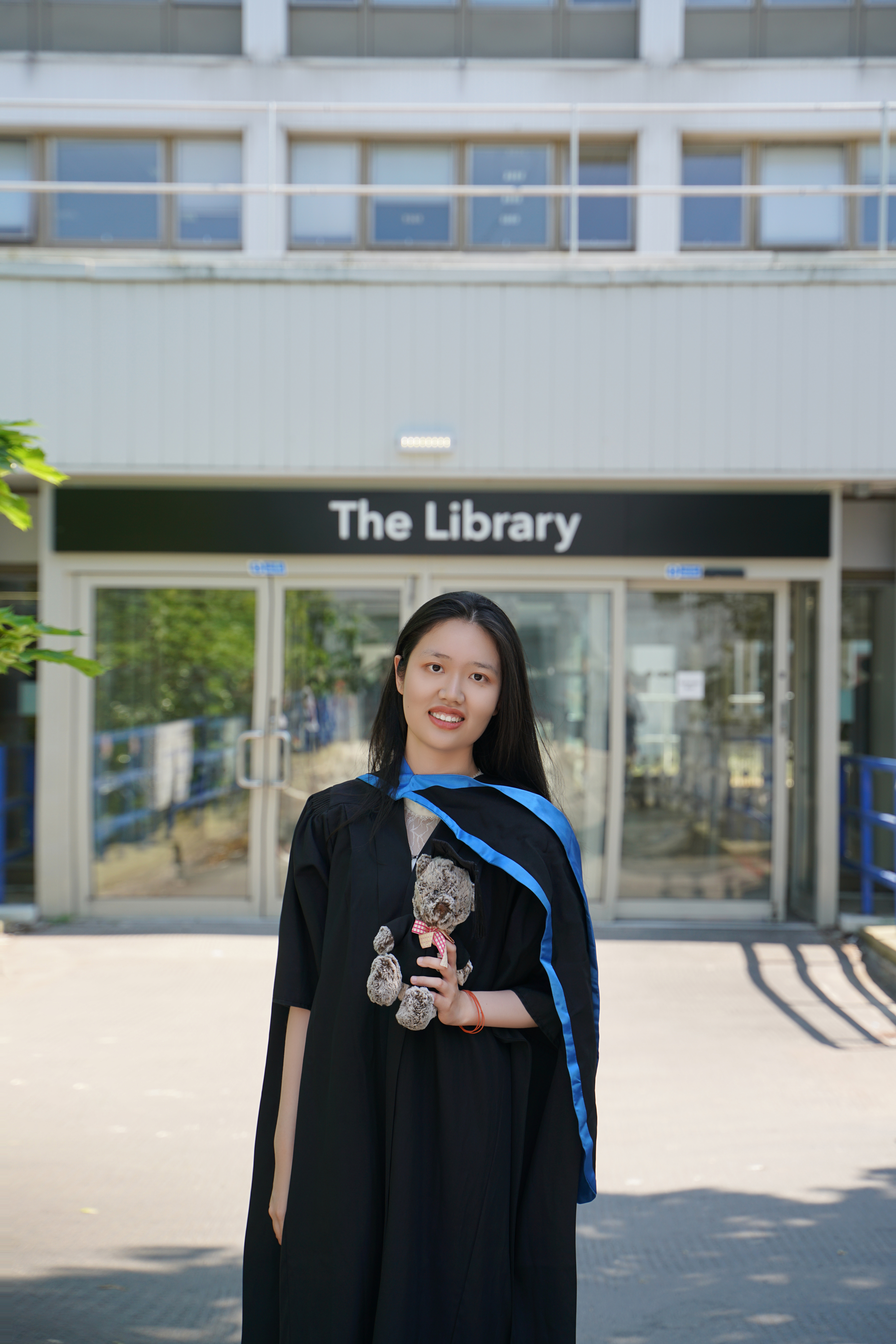 Yuan smiling at the camera.