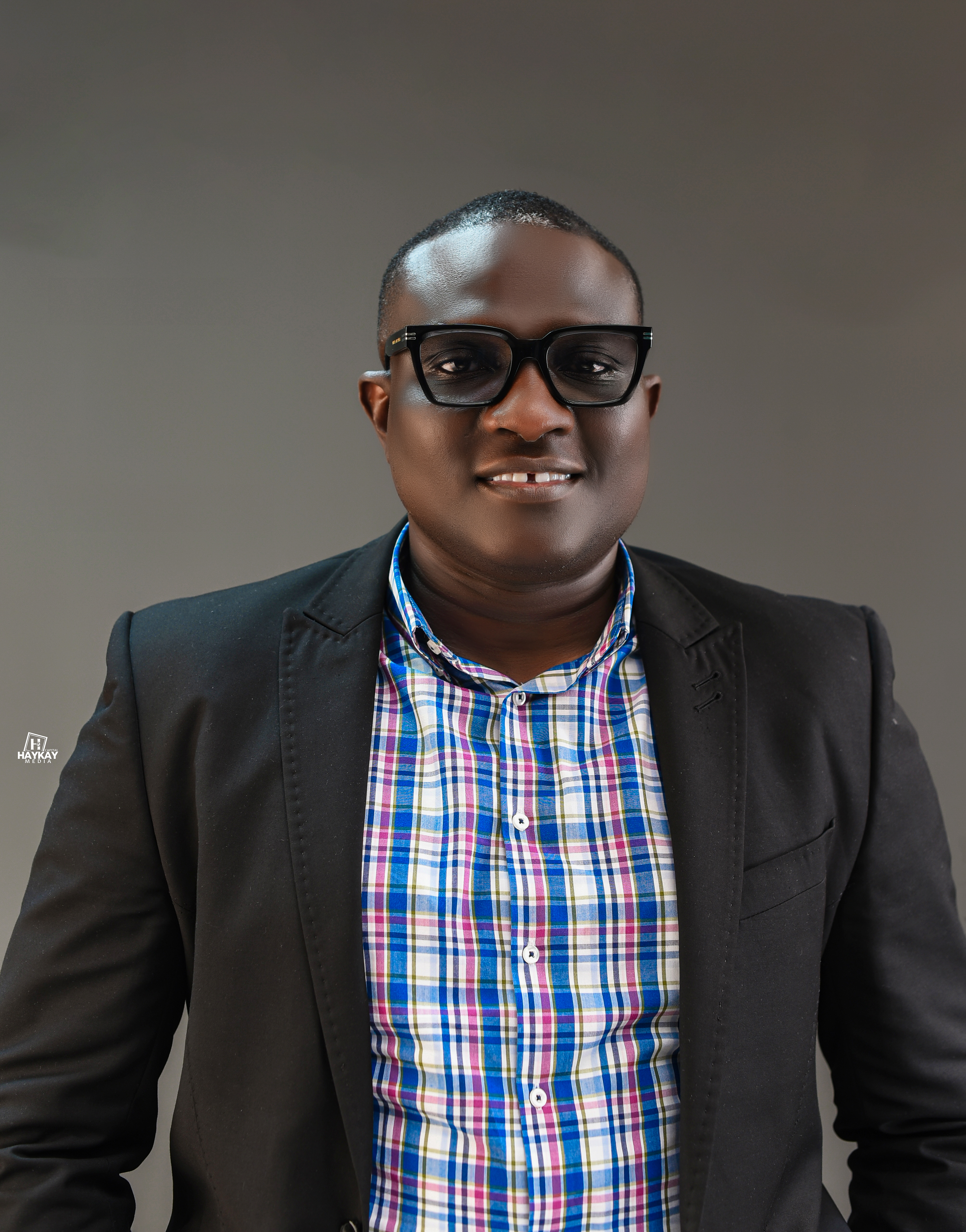 Olugbenga's professional headshot