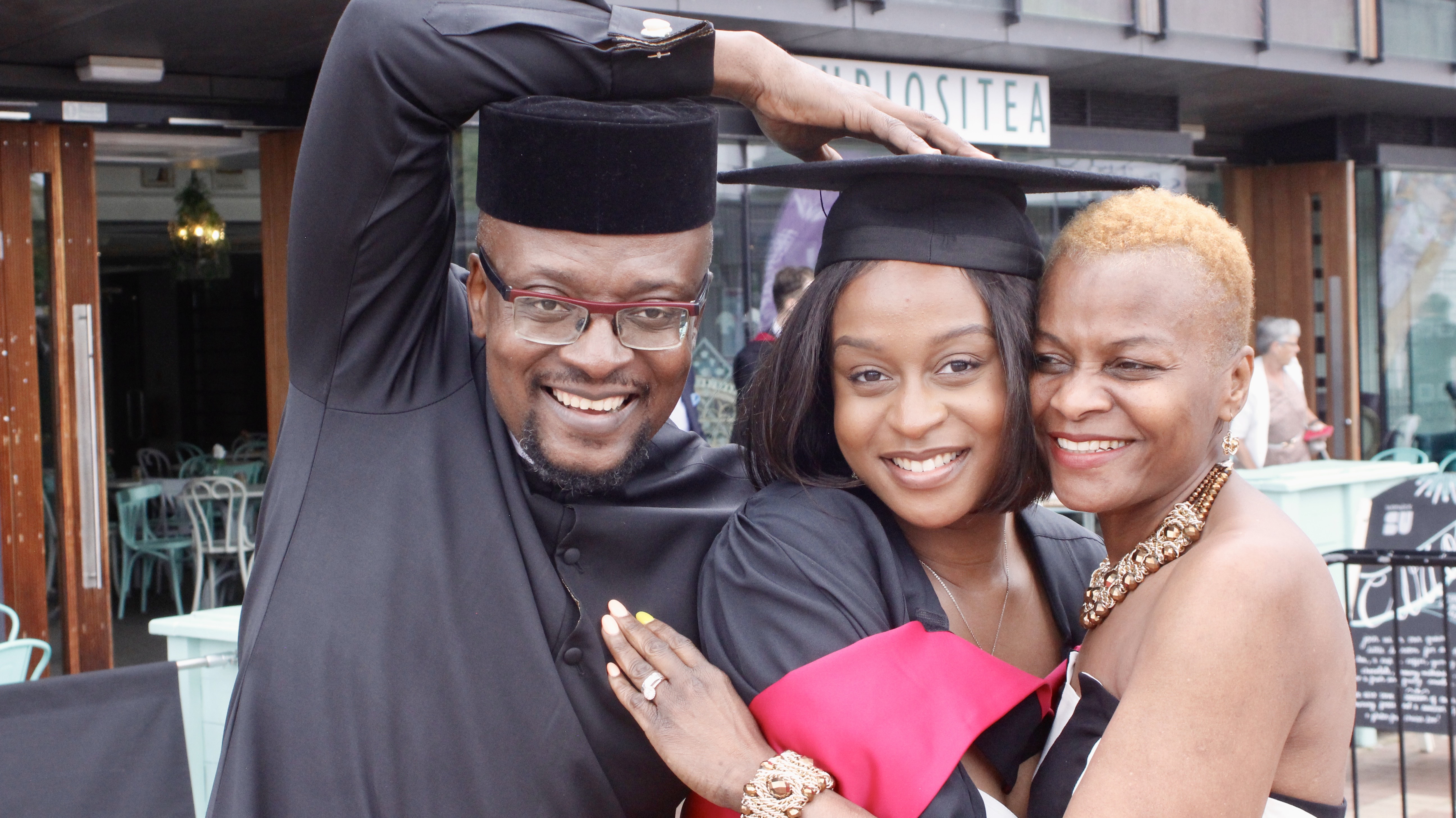 Nosa in her graduation gown with her family