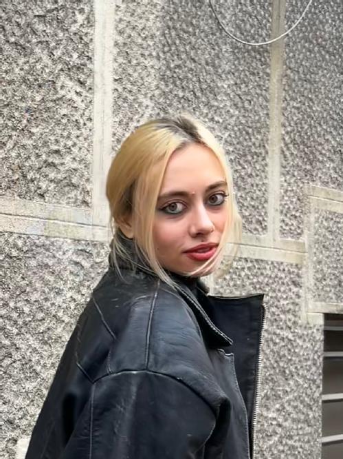Sabrina in a black leather jacket
