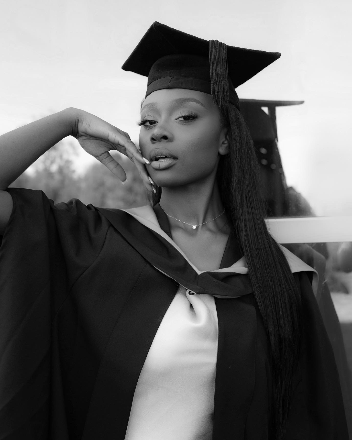 Black and white photo of Ruth in her graduation robes