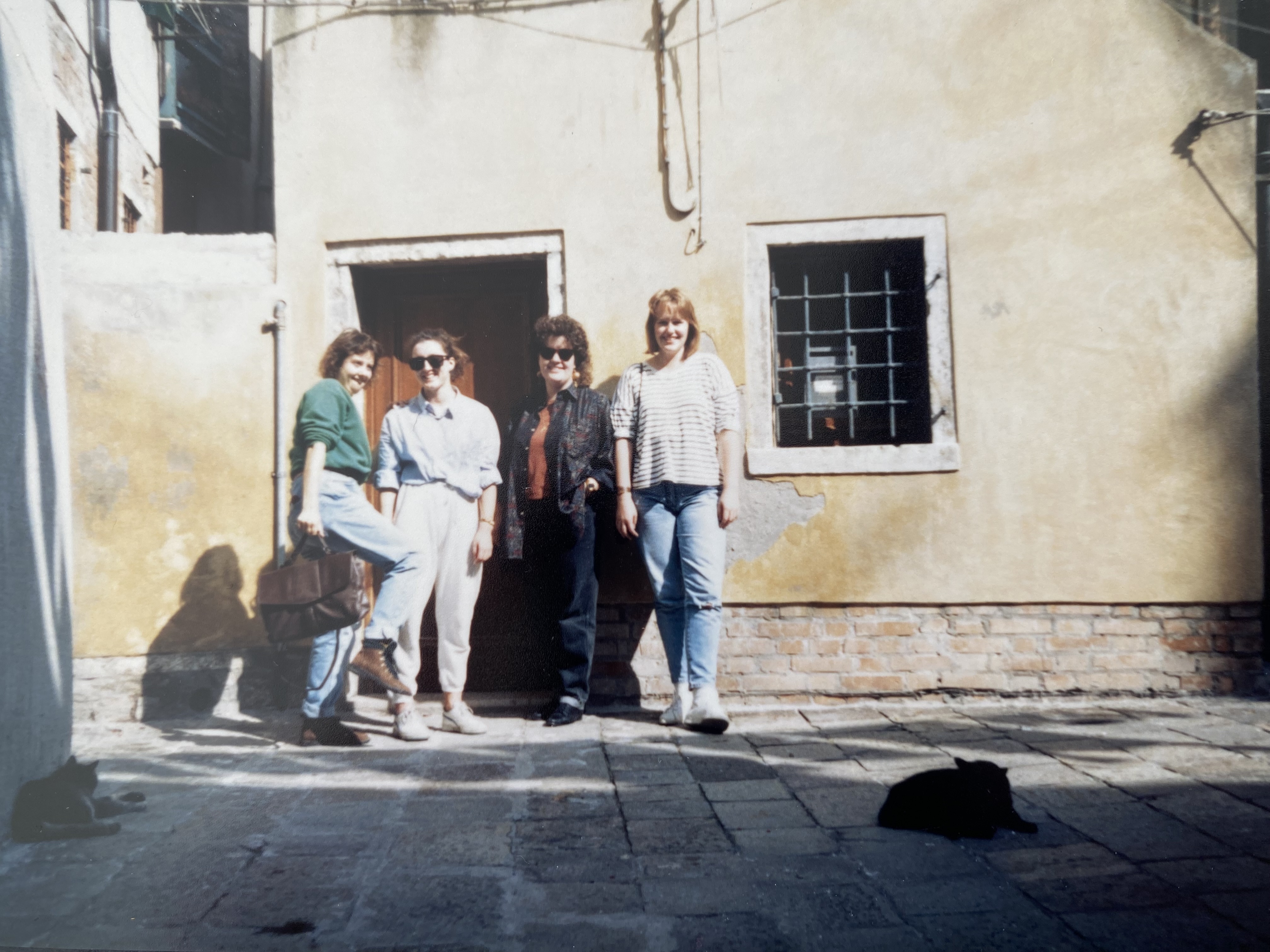 Antonia and friends outside a building in Venice