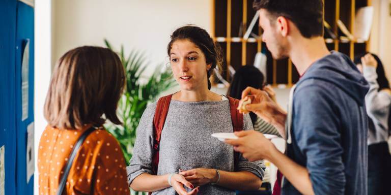 Students in conversation in PAIS