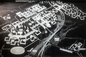 6. “A model illustrating the development plan, 1964. The positions of the existing library, administration, science and humanities buildings reflect those on the plan. But construction has not yet extended far into the country land and the dual carriageway did not materialise. Key: A. Administration; H. Humanities; HR. Halls of Residence; G. Great Hall; L-Library; S. Science; SP. Sports Pavillions; St. Stadium; T. Theatre.”