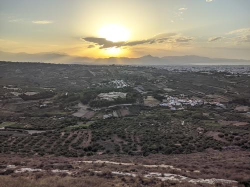 A view of the Knossos valley looking west at sunset. The Palace of Minos is located in the middle of the image.