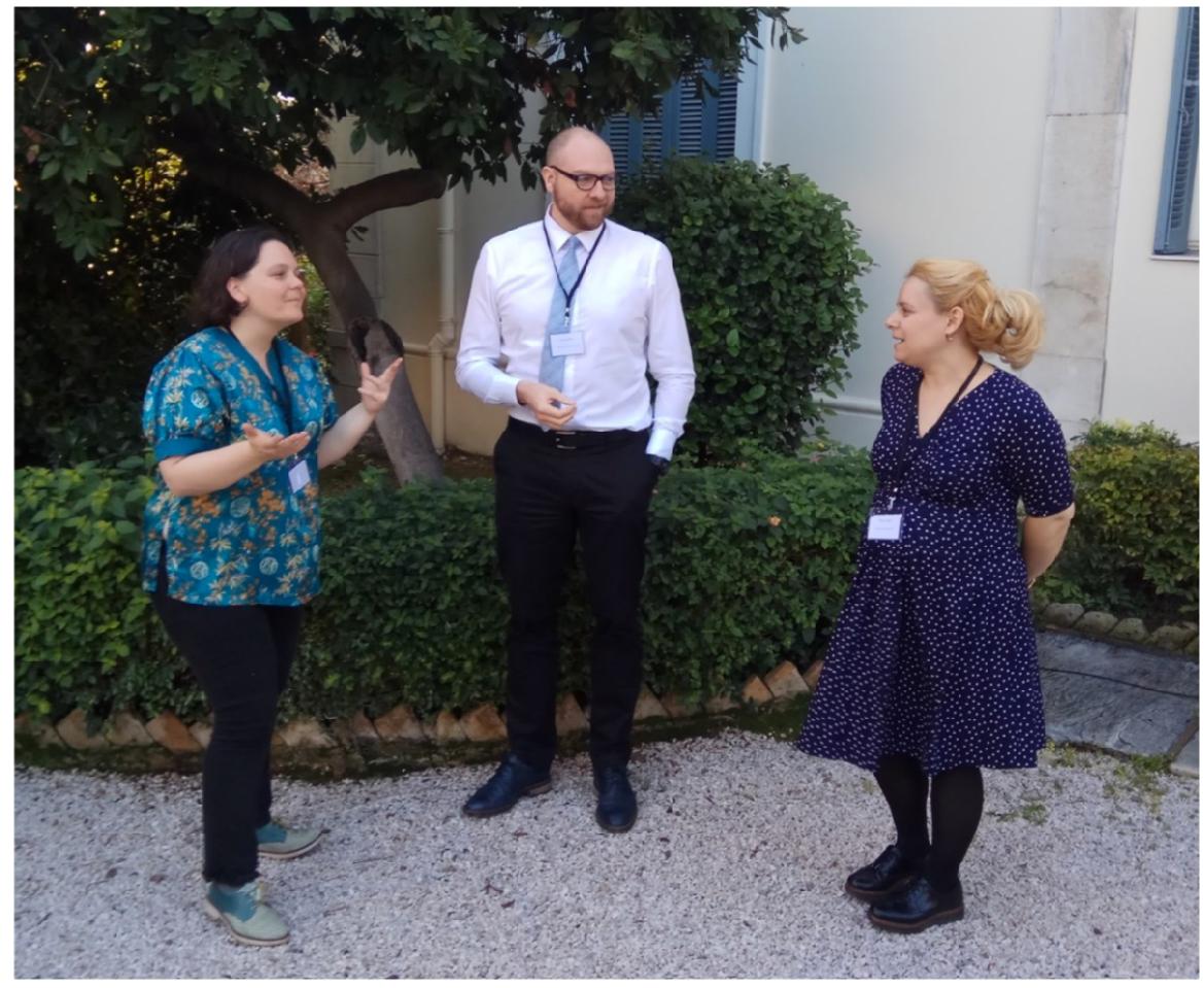   Quinn DuPont with Mairi Gkikaki (right) and Clare Rowan (left ) in the garden of the  British School at Athens, where the conversation as well as the workshop ‘Symbola: The Athenian  Legacy to Modern World’ took place.