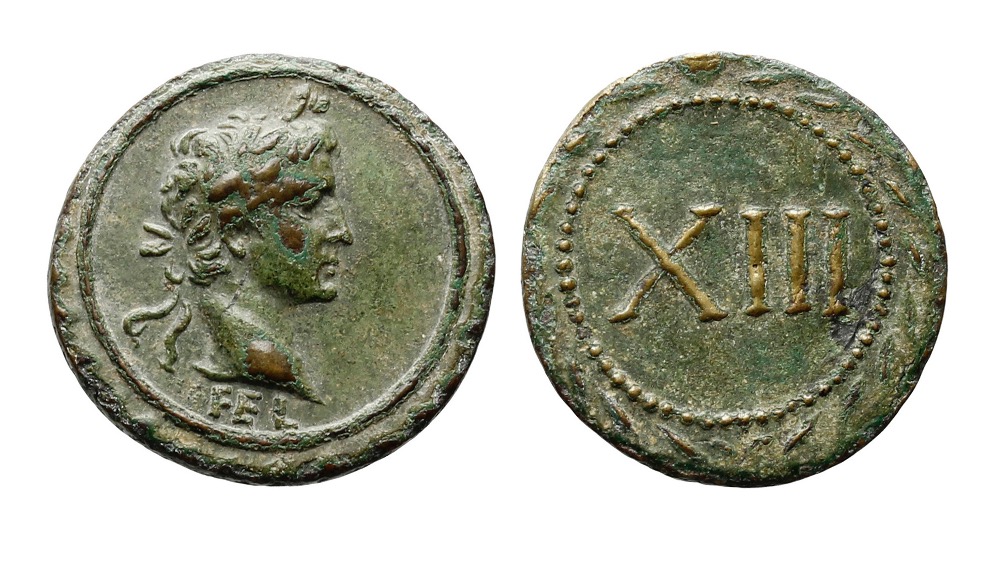 Token showing a laureate portrait of Augustus and the number 13