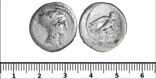 A coin depicting a mythological beast