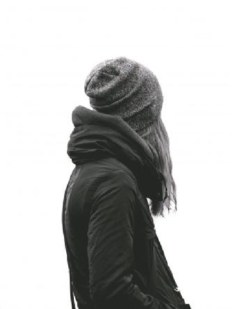 black and white photo of woman looking away