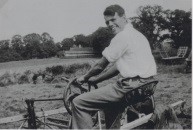 Dr Kenneth Barlow on a tractor at Binley Common Farm