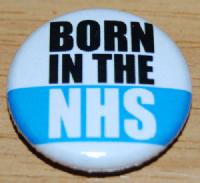 born in the NHS badge, colour photo