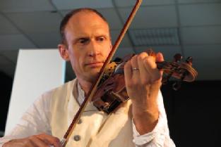 the violinist from A Malady of Migration