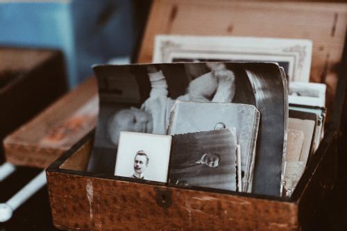 A box containing old photographs.