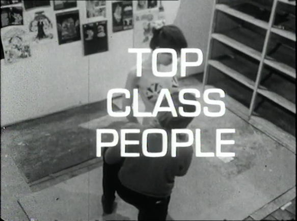Black and white title still from the Man Alive episode. The text 'Top Class People' is superimposed over a top-down shot of a fashion designer painting the naked body of a female model. The studio seems quite claustrophobic. Drawings occupy the left-hand wall, a set of empty shelving is on the right.
