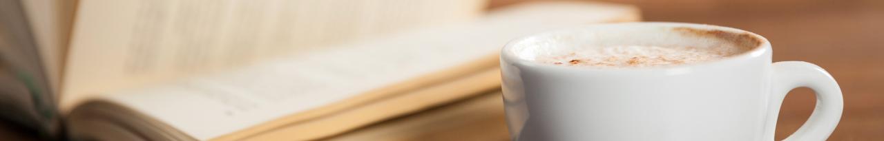 A coffee cup and a book.