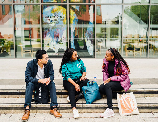 Students chatting outside the Oculus Building