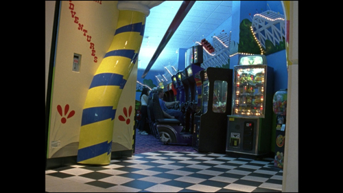 This image depicts an amusement arcade, within a shopping mall.