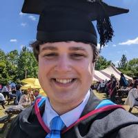 Project investigator Todd Olive in graduation regalia in Summer 2022