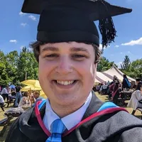Project investigator Todd Olive in graduation regalia in Summer 2022
