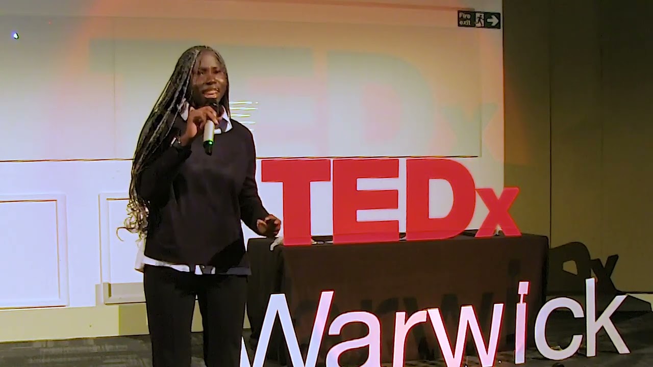 Toyosi on TED Talk stage