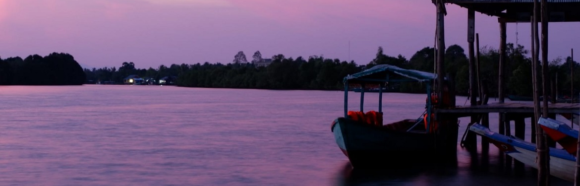 A boat at sunset in Cambodia