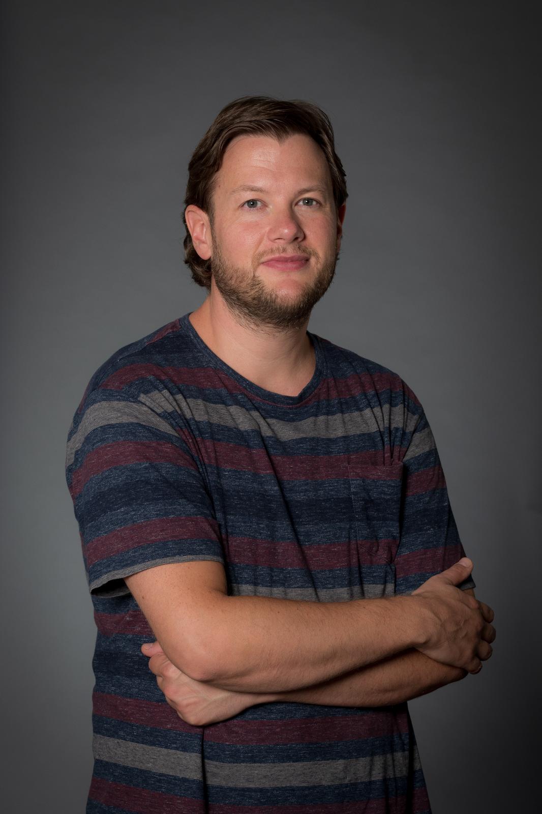 Dr Romain Chenet looks towards camera
