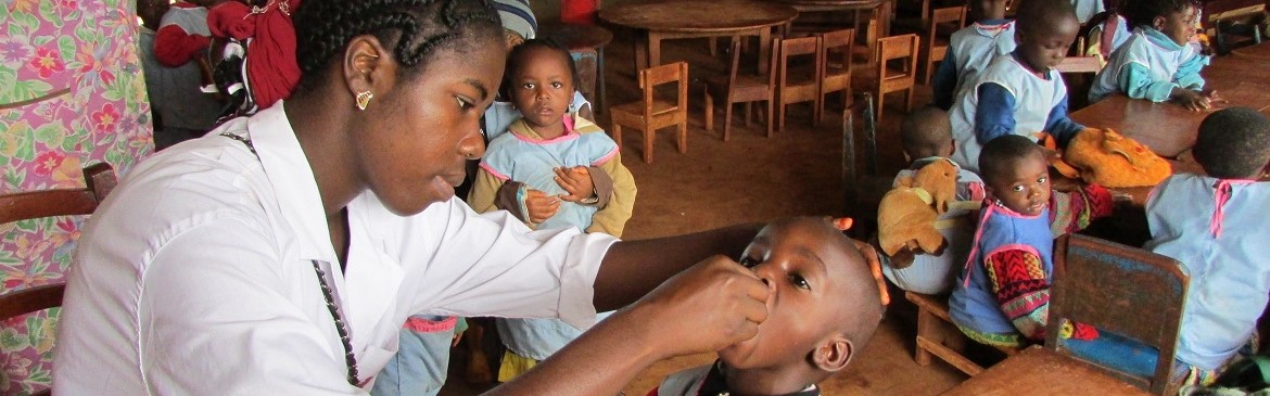 Vaccination team vaccinating children at a nursery school.