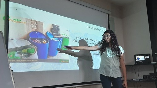 Hala lecturing about plastic pollution and the importance of recycling.