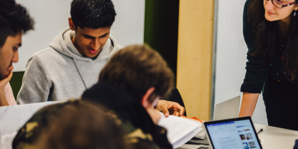 Students discussing career pathways and professional development opportunities with a Global Sustainable Development degree.