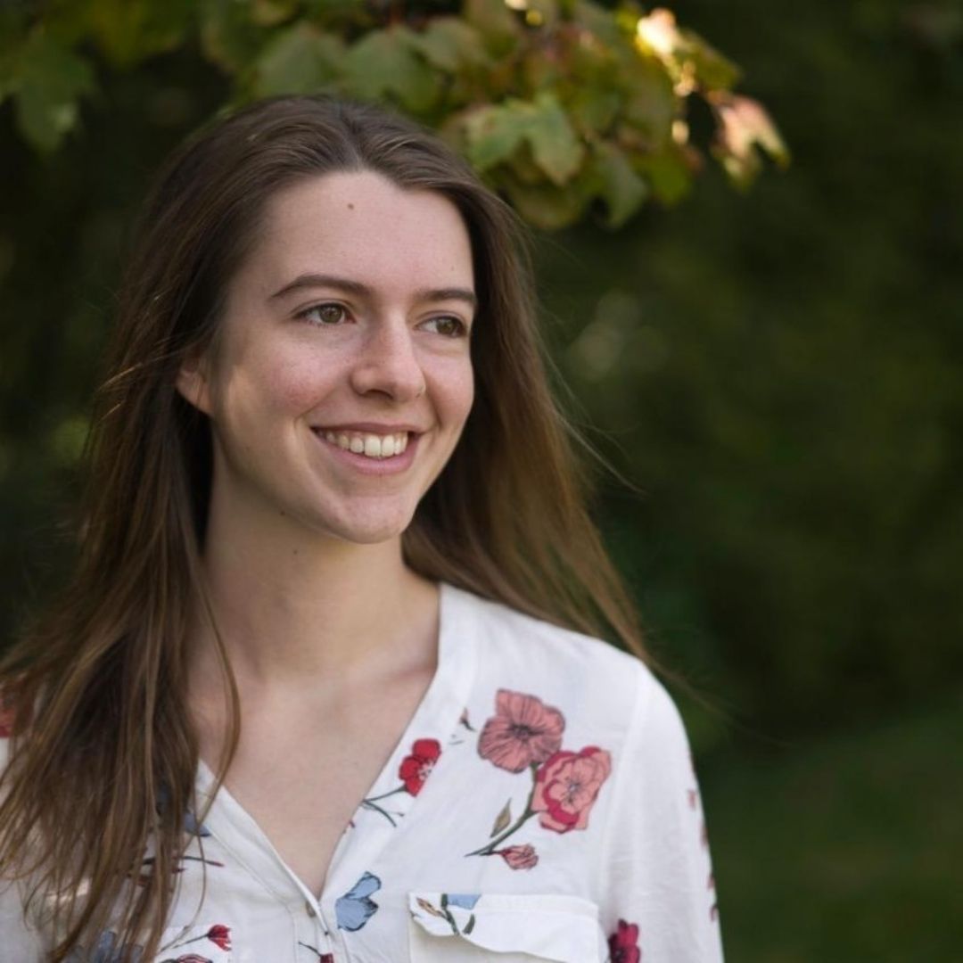 Mysterious, zombie-like figures walking through woods